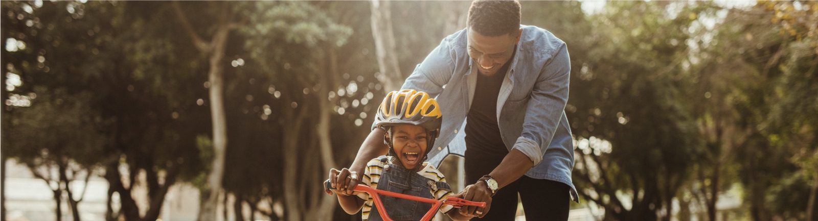 father and son riding bike