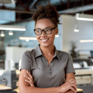 black woman wearing glasses smiling